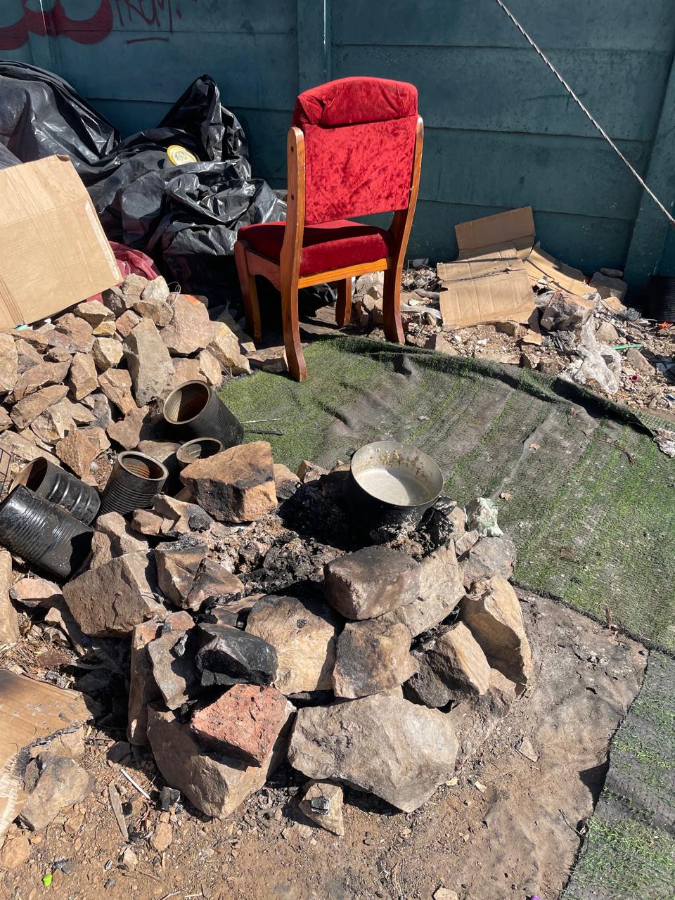 Debris and damaged surroundings at the Pinegowrie Post Office precinct